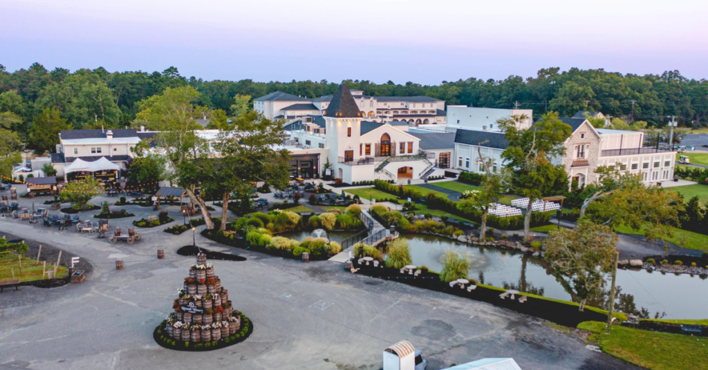 winery-resort-destination-real-estate-investment-aerial.jpg.webp (1) Aerial view of Renault Winery Resort event grounds, owned by the funds offered by Accountable Equity and operated by Vivamee Hospitality