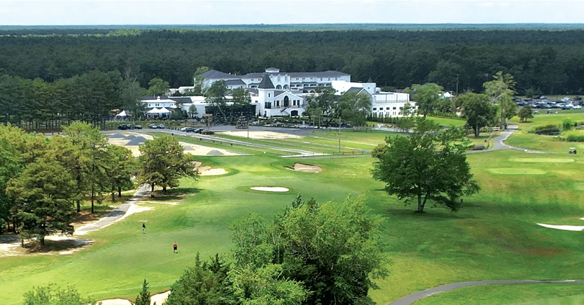 Aerial view of a drive-to destination resort showing golf course, resort buildings, and vineyard grounds in Egg Harbor City, New Jersey