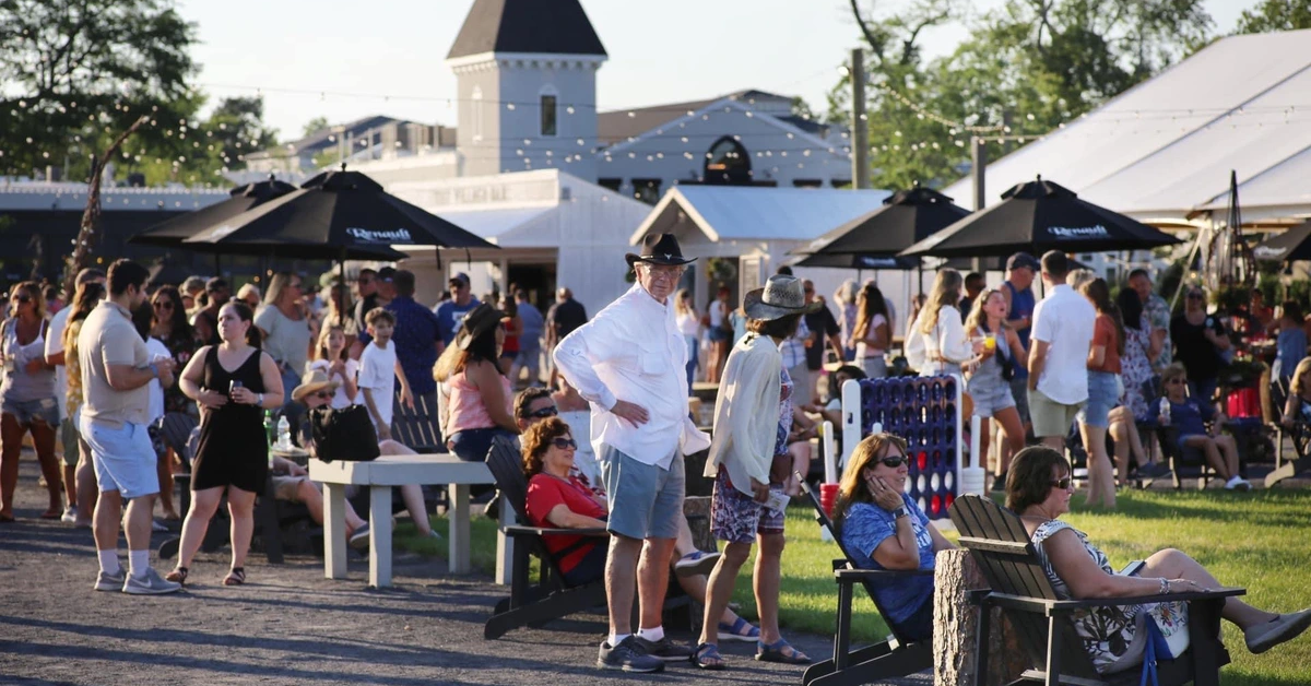 Guests enjoying an outdoor event at Renault Winery Resort in Egg Harbor City, New Jersey, demonstrating the operational scale investors evaluate during syndication due diligence